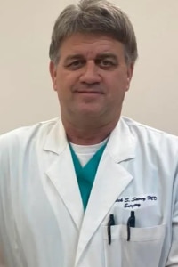 dr-patrick-savoy Professional headshot of Patrick S. Savoy, M.D., a board-certified general surgeon and regenerative medicine specialist in Oakdale, LA.